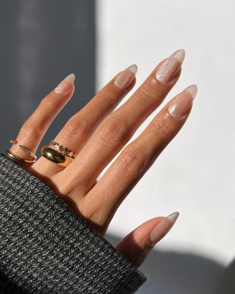 Close up of a clear velvet manicure